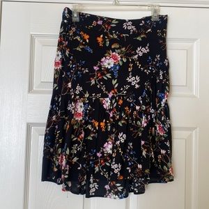 Floral black skirt with elastic waistband. Size Medium. Excellent condition.